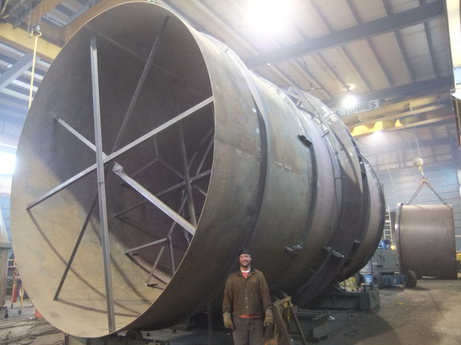 welder in front of a big steel component